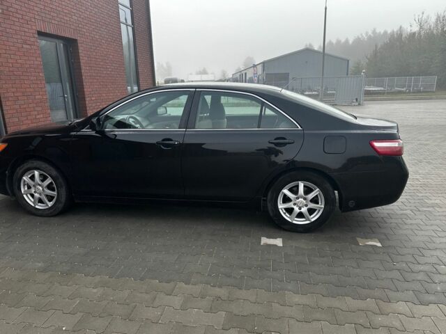 Чорний Тойота Камрі, об'ємом двигуна 2.4 л та пробігом 210 тис. км за 4550 $, фото 5 на Automoto.ua