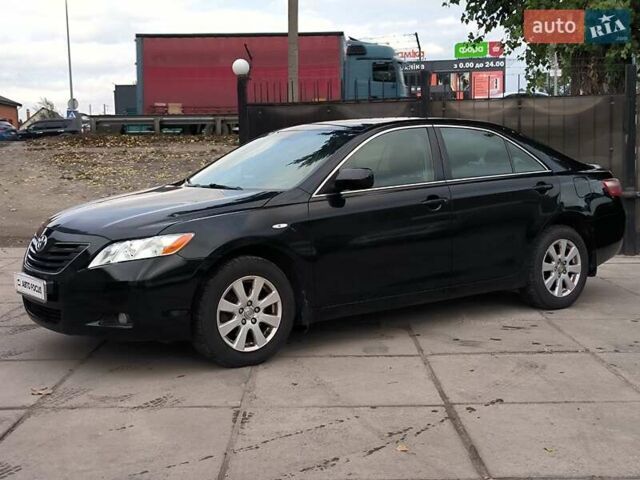 Черный Тойота Камри, объемом двигателя 2.4 л и пробегом 304 тыс. км за 6990 $, фото 2 на Automoto.ua
