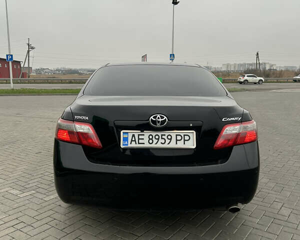 Чорний Тойота Камрі, об'ємом двигуна 2.4 л та пробігом 285 тис. км за 7800 $, фото 4 на Automoto.ua