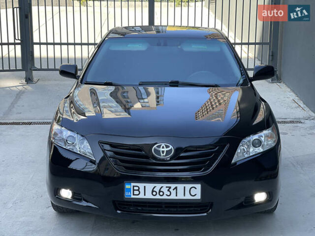 Черный Тойота Камри, объемом двигателя 2.36 л и пробегом 275 тыс. км за 6999 $, фото 11 на Automoto.ua