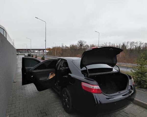 Черный Тойота Камри, объемом двигателя 2.36 л и пробегом 172 тыс. км за 11100 $, фото 13 на Automoto.ua