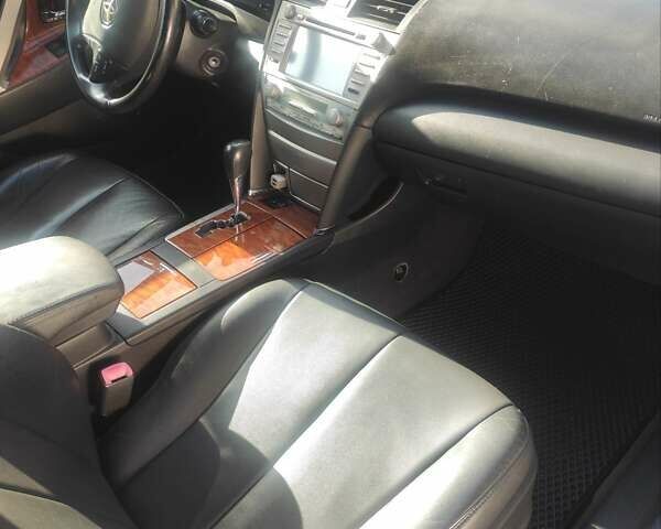 Тойота Камрі 2007 у Умани на Automoto.ua Чорний Тойота Камрі, об'ємом двигуна 2.36 л та пробігом 259 тис. км за 8200 $, фото 22 на Automoto.ua