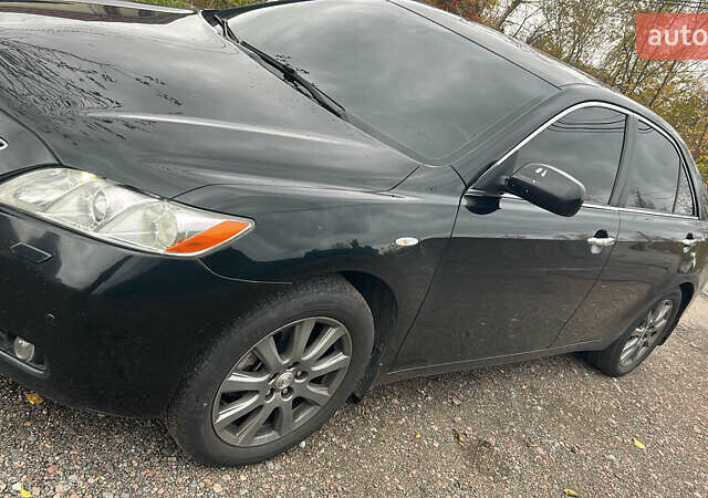 Черный Тойота Камри, объемом двигателя 3.5 л и пробегом 303 тыс. км за 8000 $, фото 1 на Automoto.ua