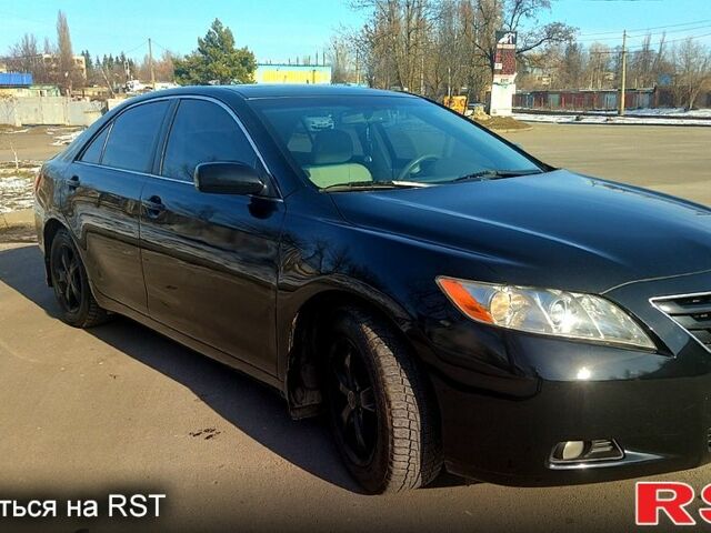 Чорний Тойота Камрі, об'ємом двигуна 24 л та пробігом 274 тис. км за 8900 $, фото 4 на Automoto.ua