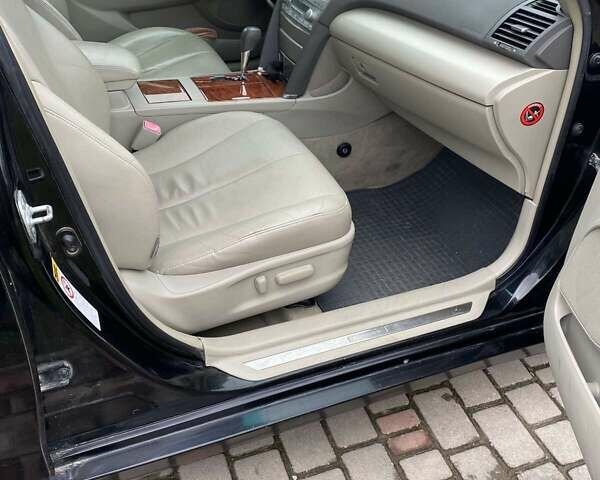 Черный Тойота Камри, объемом двигателя 2.4 л и пробегом 227 тыс. км за 8600 $, фото 4 на Automoto.ua