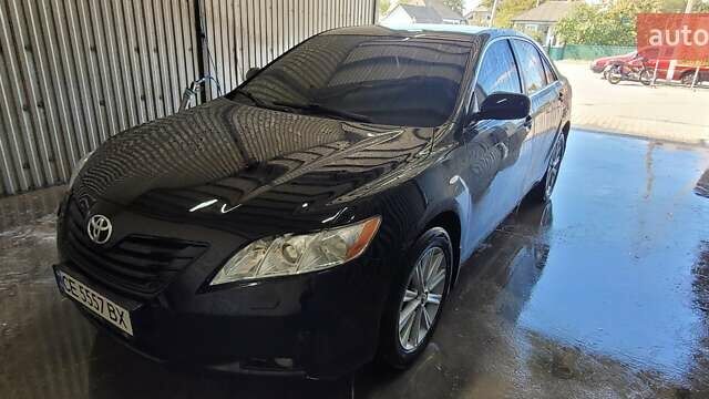 Черный Тойота Камри, объемом двигателя 3.5 л и пробегом 255 тыс. км за 11800 $, фото 18 на Automoto.ua
