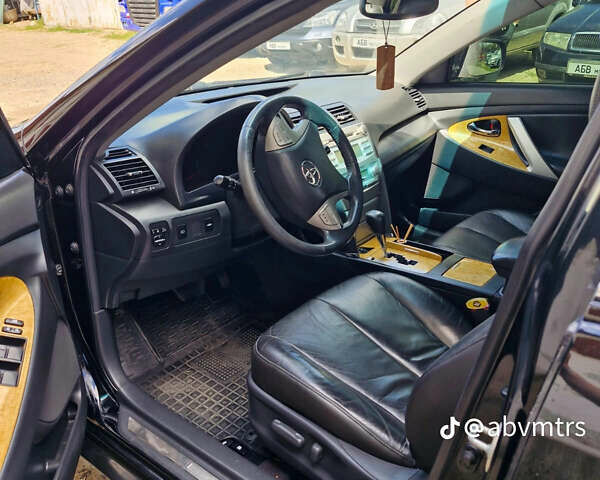 Черный Тойота Камри, объемом двигателя 2.4 л и пробегом 211 тыс. км за 7700 $, фото 4 на Automoto.ua