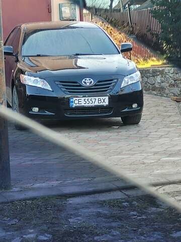 Черный Тойота Камри, объемом двигателя 3.5 л и пробегом 255 тыс. км за 11800 $, фото 2 на Automoto.ua