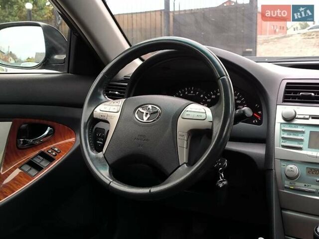 Черный Тойота Камри, объемом двигателя 2.4 л и пробегом 304 тыс. км за 6990 $, фото 13 на Automoto.ua