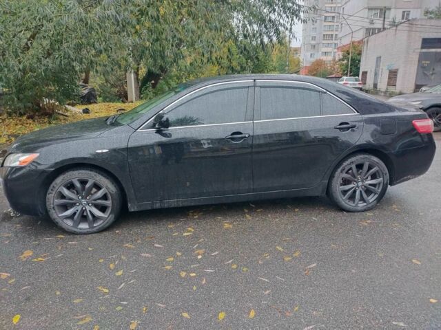 Чорний Тойота Камрі, об'ємом двигуна 2.4 л та пробігом 292 тис. км за 6995 $, фото 4 на Automoto.ua