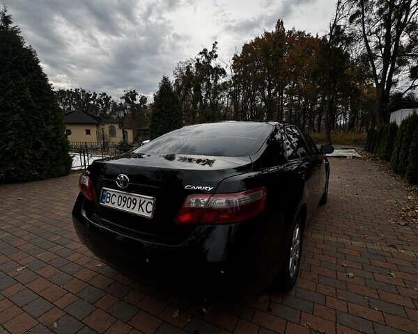 Черный Тойота Камри, объемом двигателя 2.36 л и пробегом 308 тыс. км за 7400 $, фото 8 на Automoto.ua