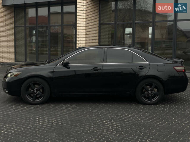 Чорний Тойота Камрі, об'ємом двигуна 2.36 л та пробігом 300 тис. км за 6900 $, фото 6 на Automoto.ua