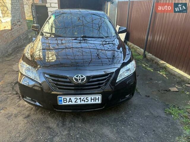 Чорний Тойота Камрі, об'ємом двигуна 2.4 л та пробігом 277 тис. км за 8700 $, фото 1 на Automoto.ua