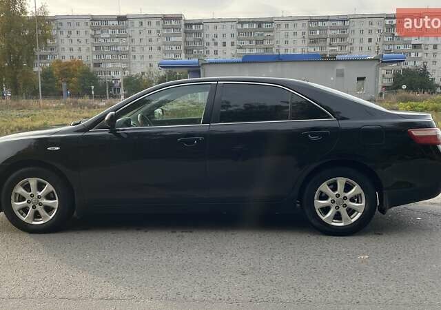 Черный Тойота Камри, объемом двигателя 2.36 л и пробегом 190 тыс. км за 8000 $, фото 1 на Automoto.ua