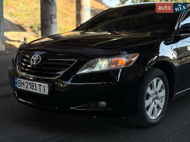 Чорний Тойота Камрі, об'ємом двигуна 2.4 л та пробігом 140 тис. км за 7999 $, фото 1 на Automoto.ua