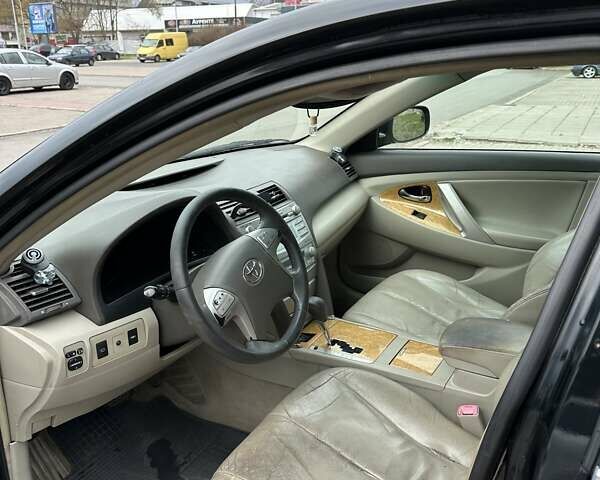 Чорний Тойота Камрі, об'ємом двигуна 2.4 л та пробігом 290 тис. км за 7500 $, фото 4 на Automoto.ua