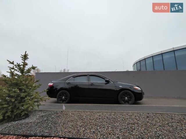 Черный Тойота Камри, объемом двигателя 2.36 л и пробегом 172 тыс. км за 11100 $, фото 3 на Automoto.ua