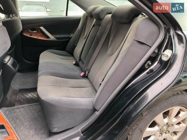 Черный Тойота Камри, объемом двигателя 2.4 л и пробегом 304 тыс. км за 6990 $, фото 9 на Automoto.ua