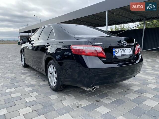 Чорний Тойота Камрі, об'ємом двигуна 3.46 л та пробігом 336 тис. км за 8900 $, фото 9 на Automoto.ua