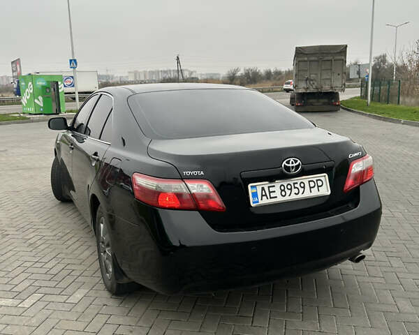 Чорний Тойота Камрі, об'ємом двигуна 2.4 л та пробігом 285 тис. км за 7800 $, фото 3 на Automoto.ua