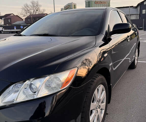 Черный Тойота Камри, объемом двигателя 2.4 л и пробегом 330 тыс. км за 9500 $, фото 7 на Automoto.ua