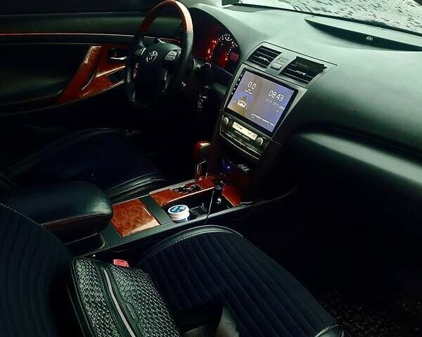 Черный Тойота Камри, объемом двигателя 3.5 л и пробегом 255 тыс. км за 11800 $, фото 3 на Automoto.ua