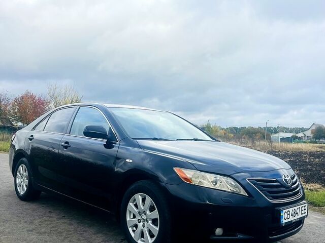 Черный Тойота Камри, объемом двигателя 2.4 л и пробегом 343 тыс. км за 8500 $, фото 1 на Automoto.ua