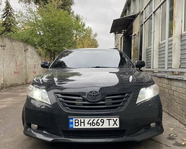 Черный Тойота Камри, объемом двигателя 3.5 л и пробегом 291 тыс. км за 10500 $, фото 1 на Automoto.ua