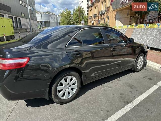 Черный Тойота Камри, объемом двигателя 2.4 л и пробегом 306 тыс. км за 10500 $, фото 1 на Automoto.ua