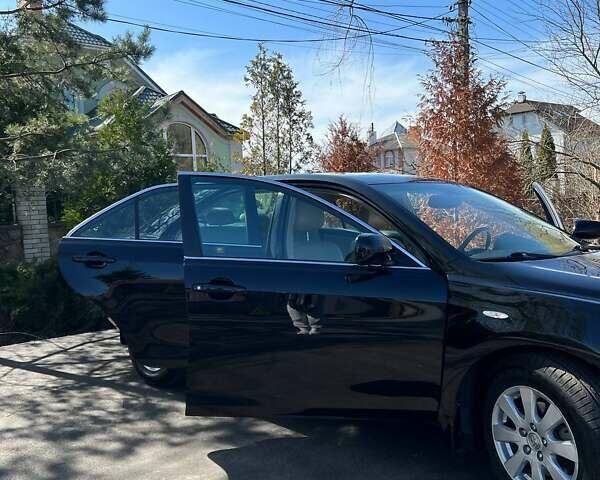 Черный Тойота Камри, объемом двигателя 2.4 л и пробегом 159 тыс. км за 12500 $, фото 29 на Automoto.ua