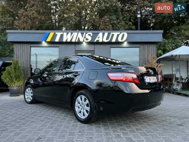 Черный Тойота Камри, объемом двигателя 2.4 л и пробегом 195 тыс. км за 8900 $, фото 22 на Automoto.ua