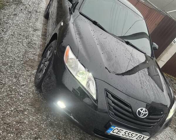 Черный Тойота Камри, объемом двигателя 3.5 л и пробегом 255 тыс. км за 11800 $, фото 21 на Automoto.ua