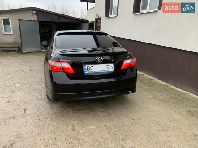 Черный Тойота Камри, объемом двигателя 2.4 л и пробегом 237 тыс. км за 8700 $, фото 7 на Automoto.ua
