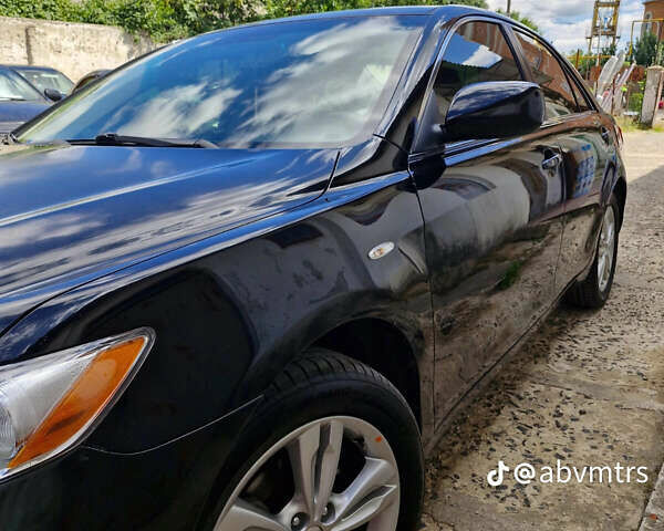 Черный Тойота Камри, объемом двигателя 2.4 л и пробегом 211 тыс. км за 7700 $, фото 2 на Automoto.ua