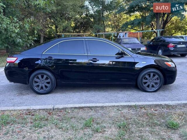 Чорний Тойота Камрі, об'ємом двигуна 2.4 л та пробігом 352 тис. км за 5500 $, фото 4 на Automoto.ua