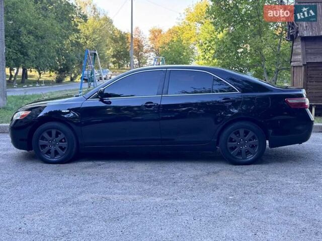 Чорний Тойота Камрі, об'ємом двигуна 2.4 л та пробігом 352 тис. км за 5500 $, фото 5 на Automoto.ua