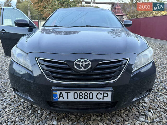 Черный Тойота Камри, объемом двигателя 2.36 л и пробегом 180 тыс. км за 8000 $, фото 1 на Automoto.ua
