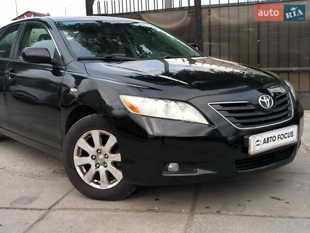 Черный Тойота Камри, объемом двигателя 2.4 л и пробегом 304 тыс. км за 6990 $, фото 3 на Automoto.ua