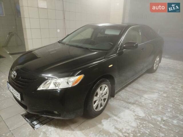 Черный Тойота Камри, объемом двигателя 2.36 л и пробегом 245 тыс. км за 8300 $, фото 7 на Automoto.ua