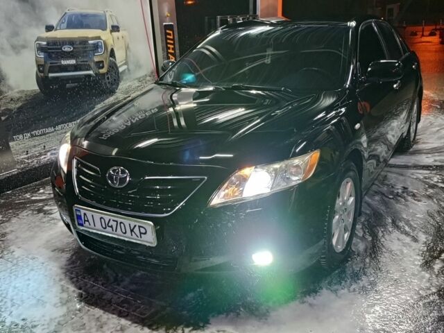 Чорний Тойота Камрі, об'ємом двигуна 2.4 л та пробігом 1000 тис. км за 8000 $, фото 1 на Automoto.ua