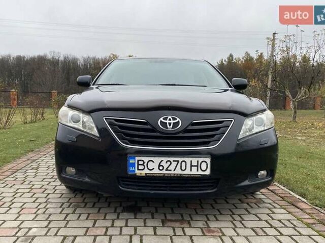 Черный Тойота Камри, объемом двигателя 2.4 л и пробегом 227 тыс. км за 8600 $, фото 19 на Automoto.ua