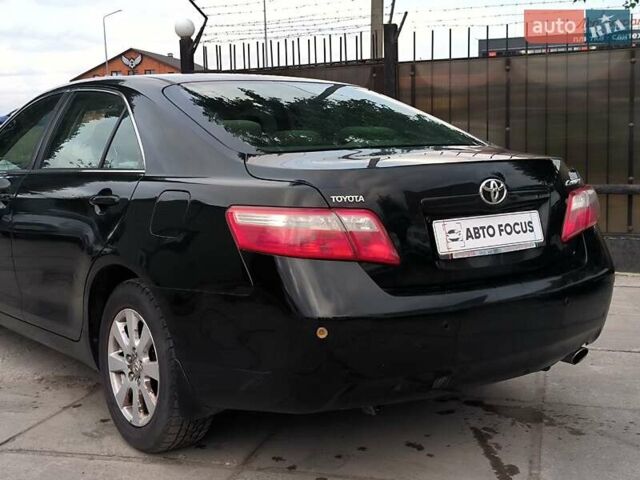 Черный Тойота Камри, объемом двигателя 2.4 л и пробегом 304 тыс. км за 6990 $, фото 7 на Automoto.ua