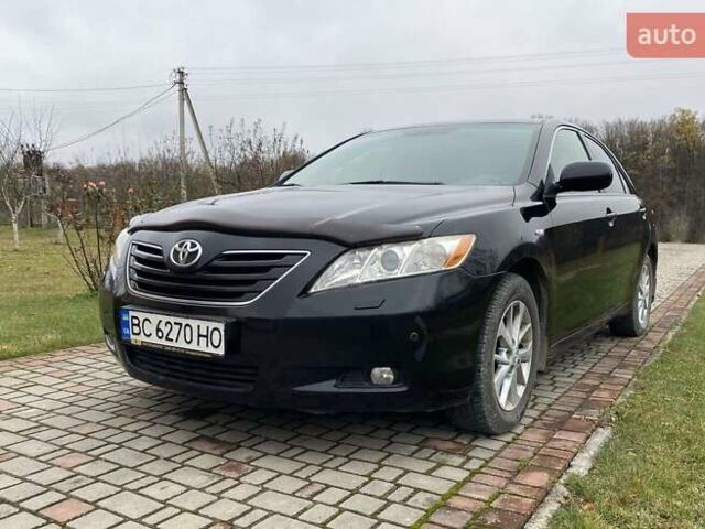 Черный Тойота Камри, объемом двигателя 2.4 л и пробегом 227 тыс. км за 8600 $, фото 18 на Automoto.ua