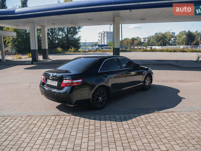 Чорний Тойота Камрі, об'ємом двигуна 2.4 л та пробігом 260 тис. км за 8750 $, фото 9 на Automoto.ua