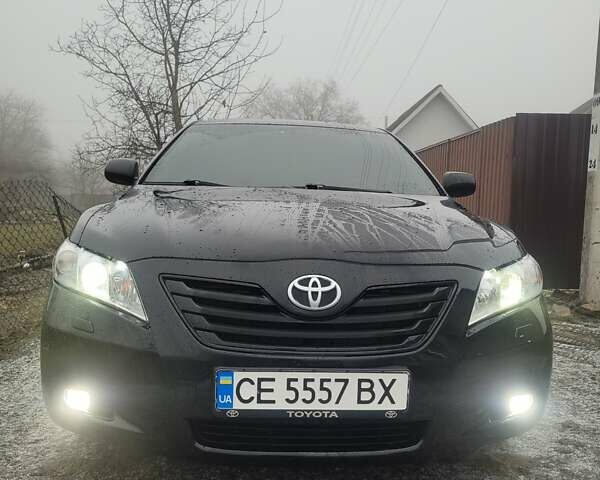 Черный Тойота Камри, объемом двигателя 3.5 л и пробегом 255 тыс. км за 11800 $, фото 22 на Automoto.ua