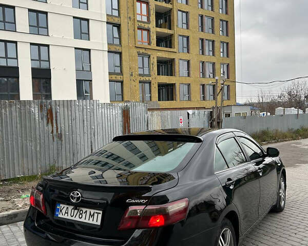 Черный Тойота Камри, объемом двигателя 2.36 л и пробегом 350 тыс. км за 6700 $, фото 1 на Automoto.ua