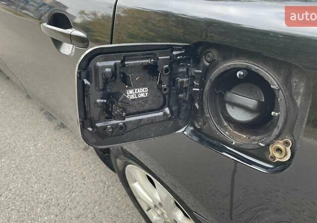 Черный Тойота Камри, объемом двигателя 2.36 л и пробегом 190 тыс. км за 8000 $, фото 9 на Automoto.ua