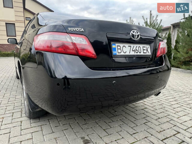 Чорний Тойота Камрі, об'ємом двигуна 2.36 л та пробігом 257 тис. км за 6500 $, фото 7 на Automoto.ua