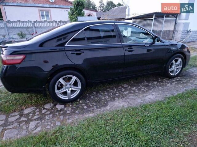 Чорний Тойота Камрі, об'ємом двигуна 2.36 л та пробігом 299 тис. км за 8888 $, фото 3 на Automoto.ua