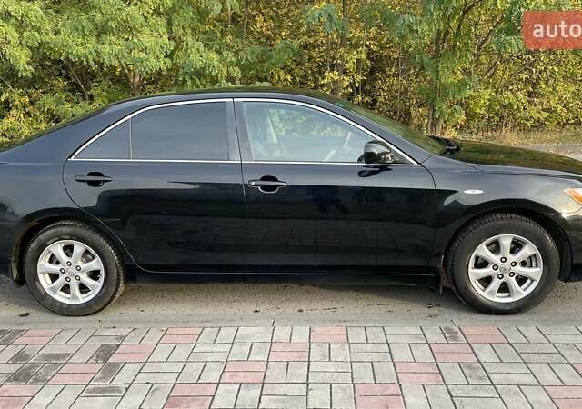 Черный Тойота Камри, объемом двигателя 2.36 л и пробегом 190 тыс. км за 8000 $, фото 8 на Automoto.ua